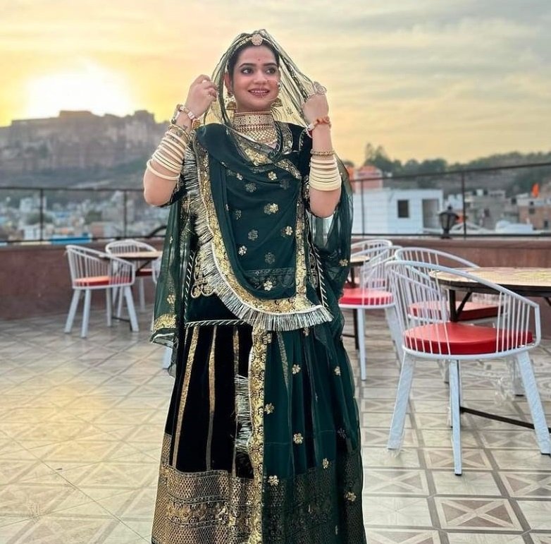 Green Coloured Velvet Poshak With Sandwich Sequence And Codding Work