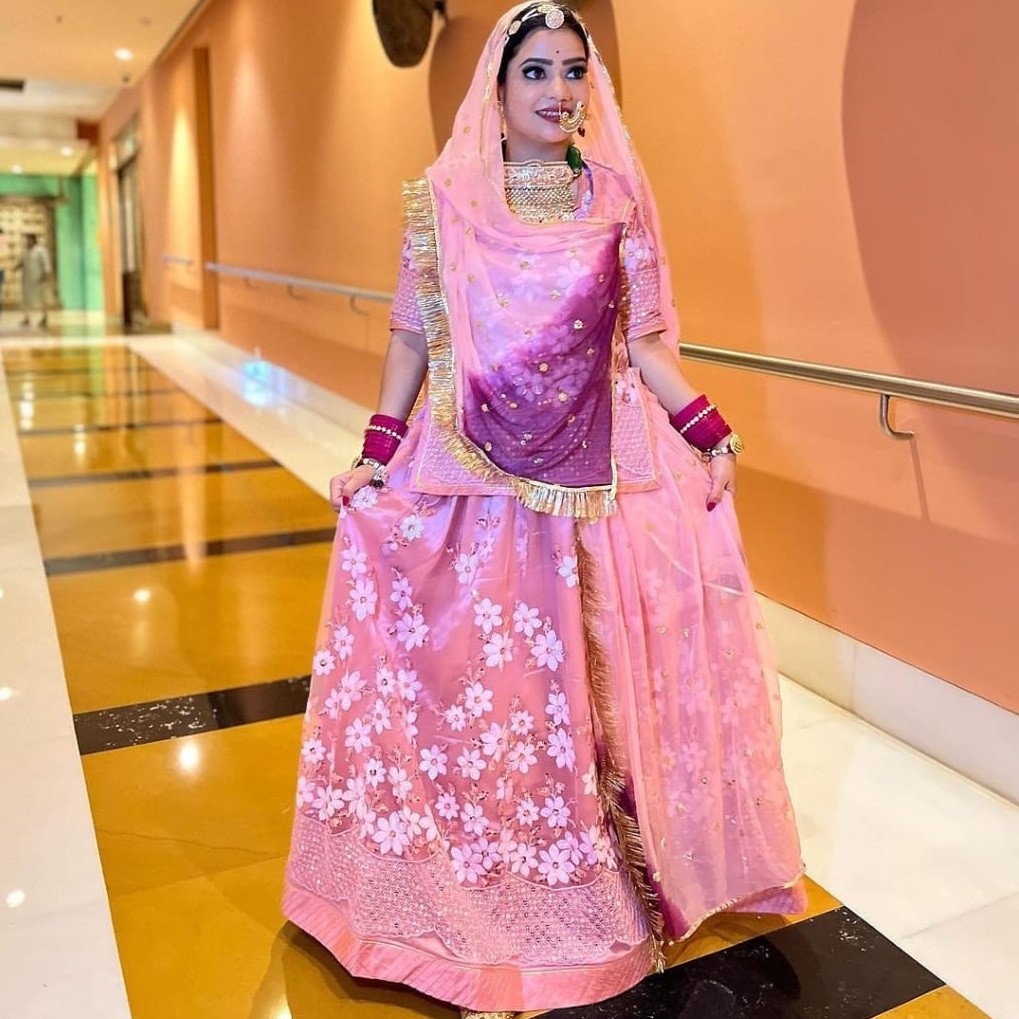 Pink Coloured Net Poshak With Exquisite Sequence codding Work And Humrahi Pure