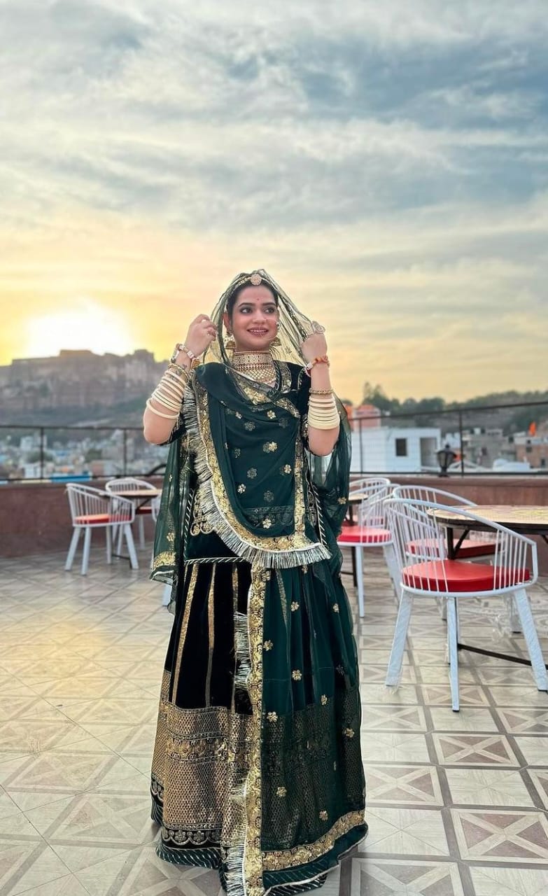 Green Coloured Velvet Poshak With Sandwich Sequence And Codding Work