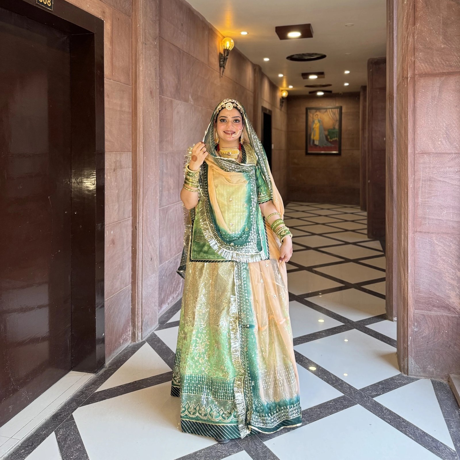 Emerald Enchantment: Verdant Organza Poshak(semi stich)