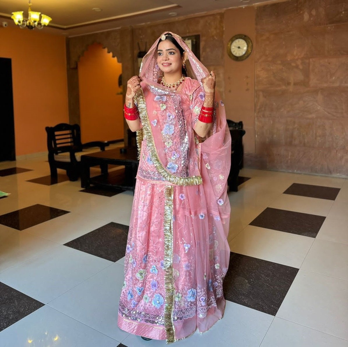 Bindani Blush Blossom: Pink Net Poshak with Floral Embroidery(Semi stich)