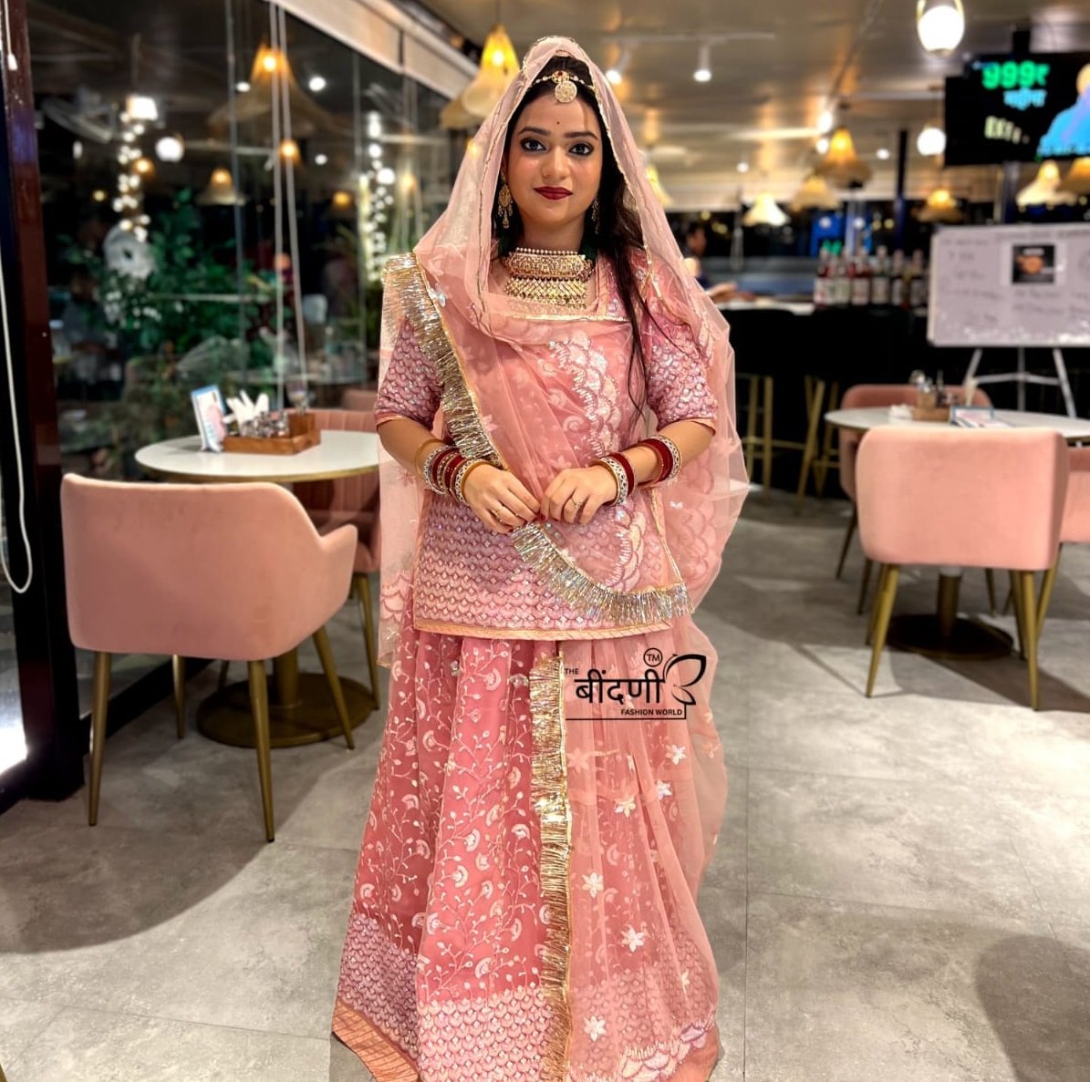 Blushing Elegance: Pink Net Poshak with Sheer Net Odhna(Semi stich)