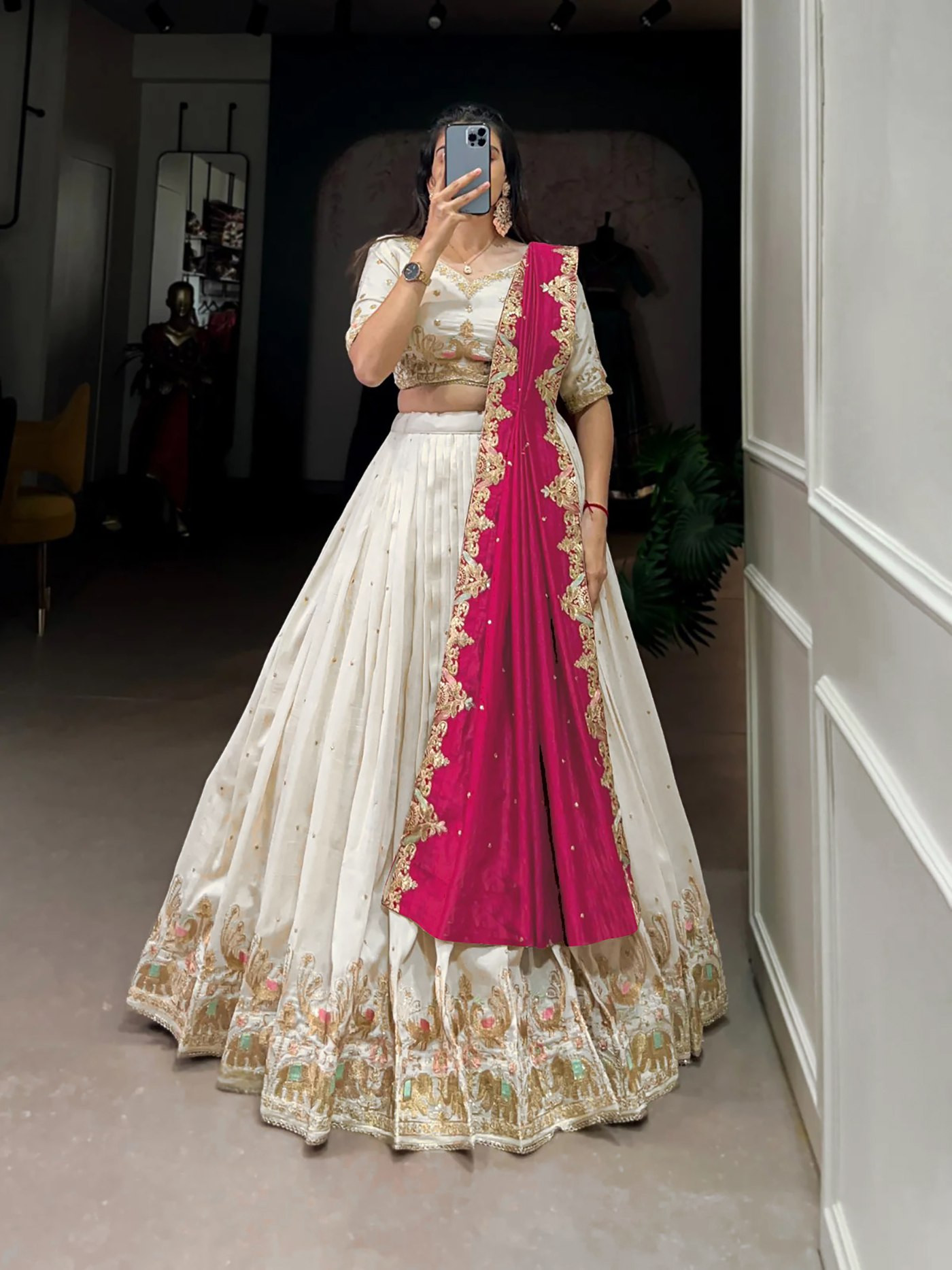 Embellished White Semi-Stitched Chinon Lehenga Choli with Embroidered Zari Work & Sequins Dupatta  Description: