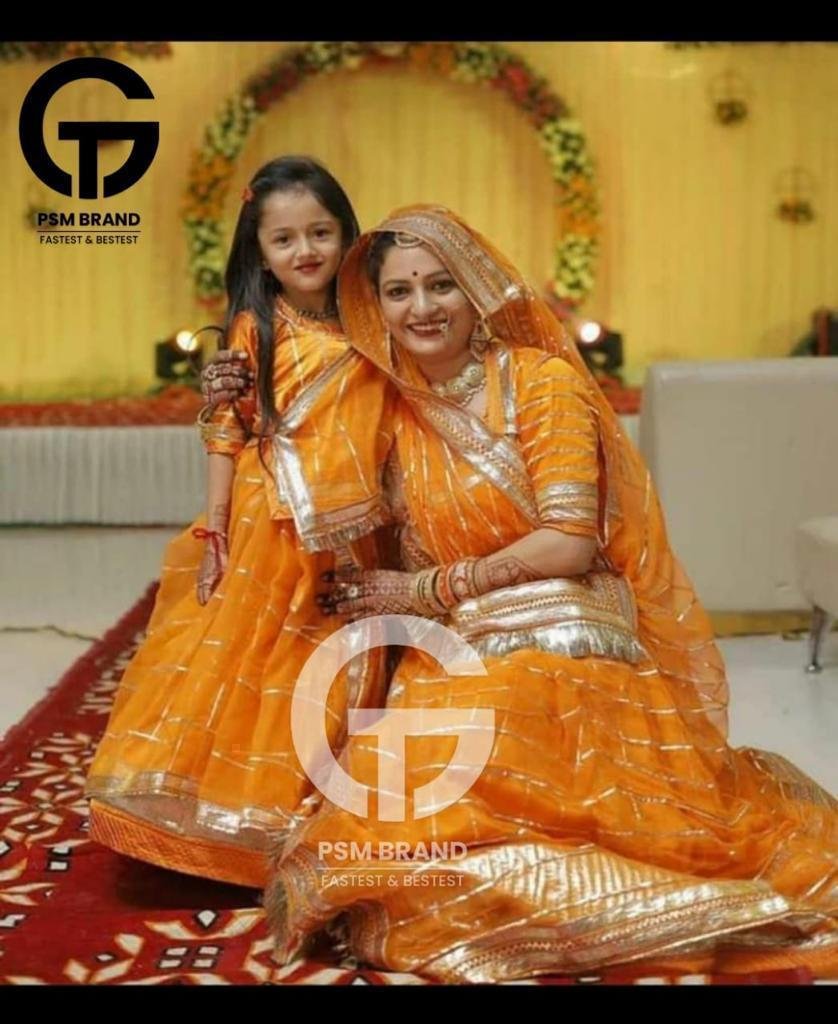 Mother Daughter Combo Rajputi Suit With Heavy Jaal Laffa Work In Dark Orange coloured