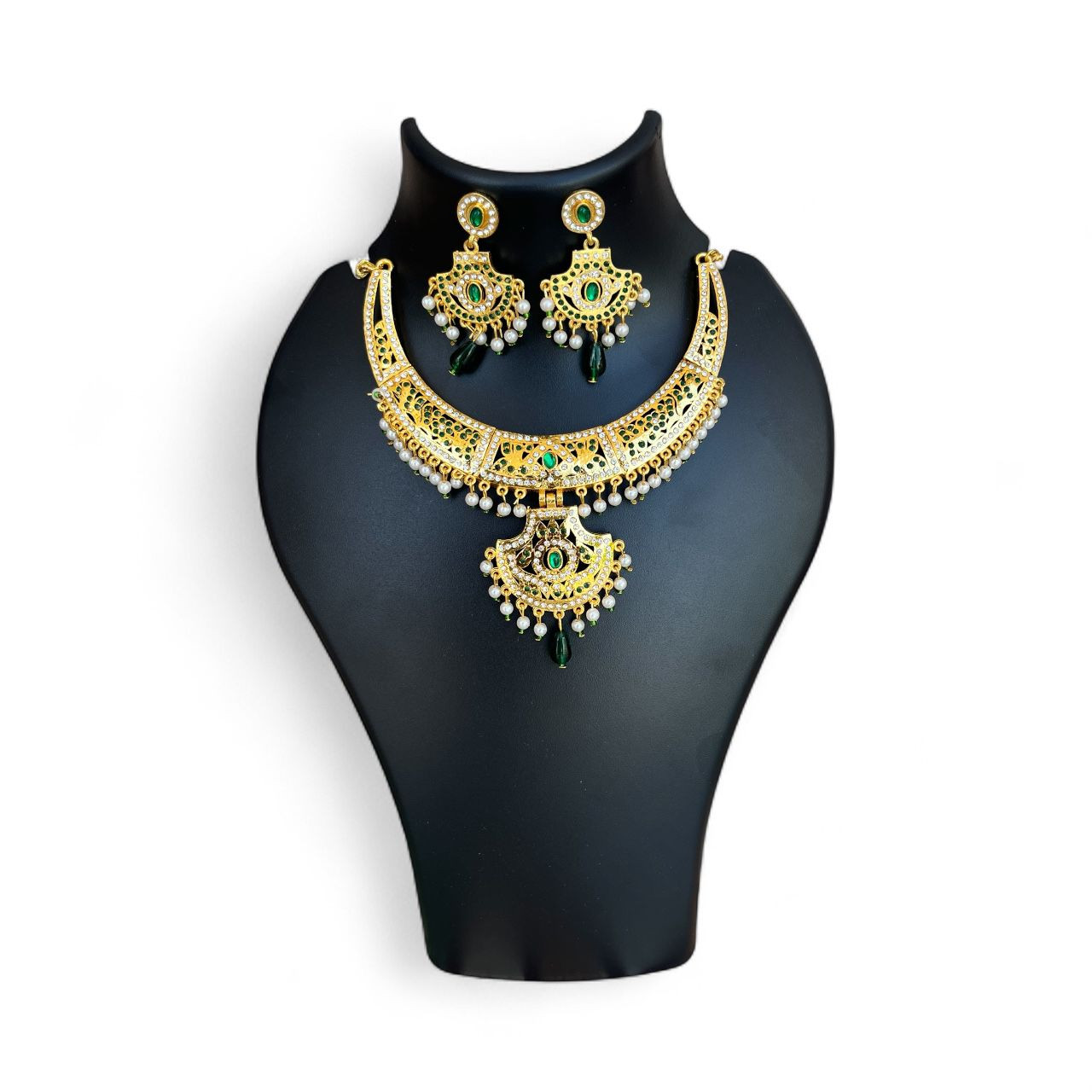 Gold Look Kundan style necklace set with green stones and pearls