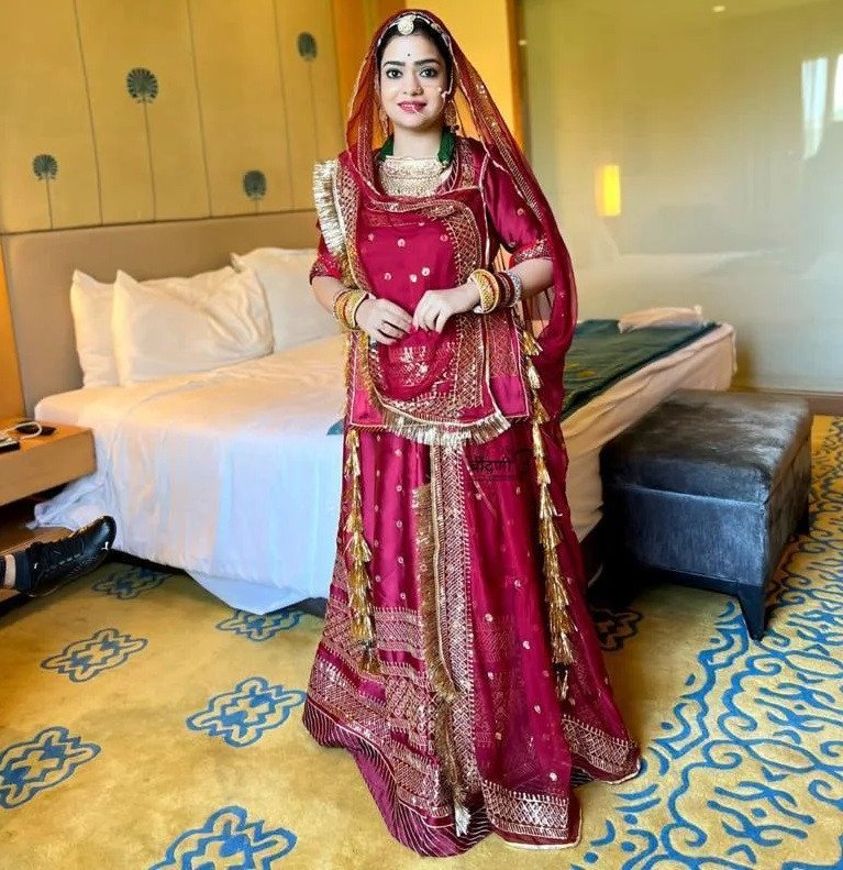 Regal Crimson Elegance: Maroon Satin With Lahriya Boder Poshak(Semi stich)